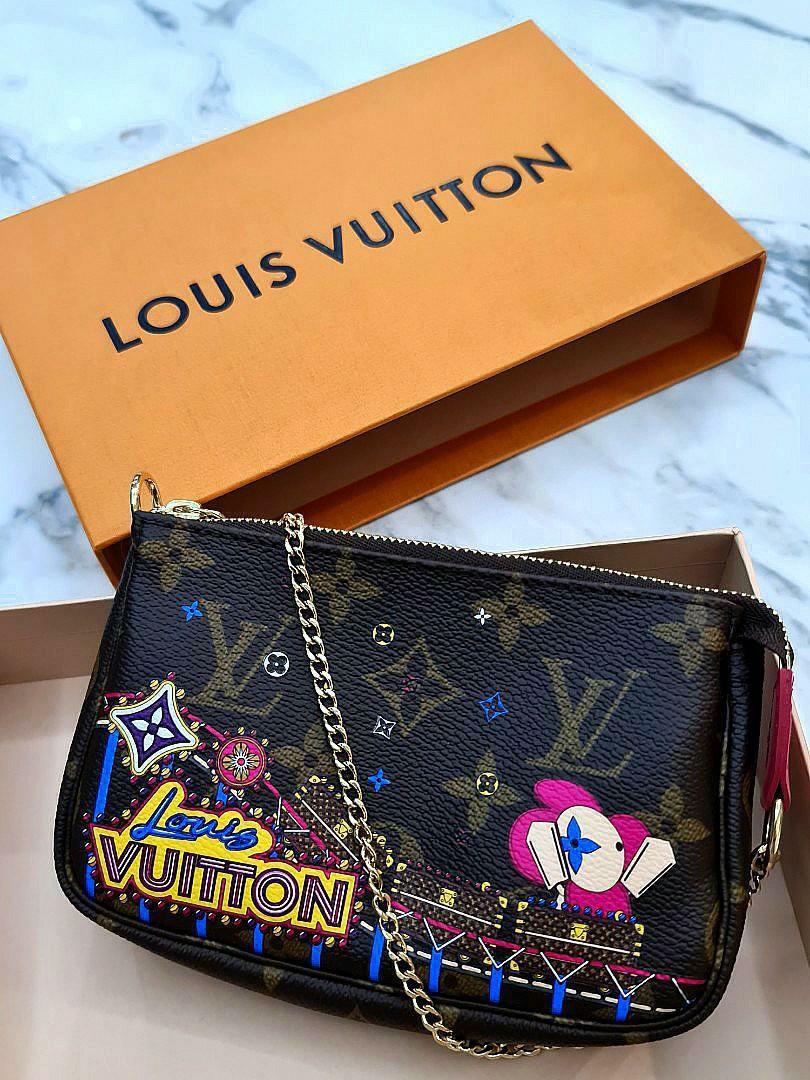 NWT Louis Vuitton Vivienne Monogram Mini Pochette Accessoires M69752