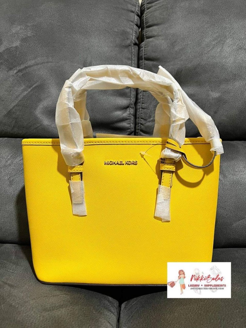 mk yellow sling bag