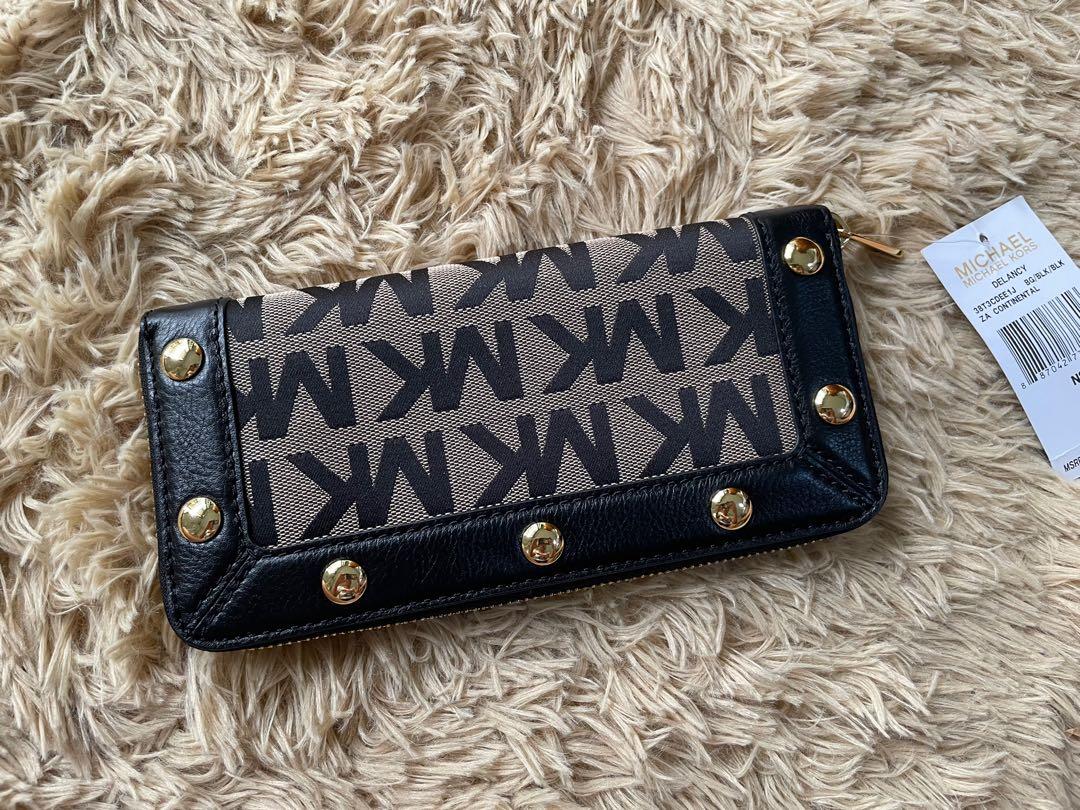 Mikhael Kors Wallet (Category: Luxury Bags & Wallets) located in Quezon City. Submitted by mirandasells12 (Listing ID 1157524629, Image 3). Description: Original Price: 188 dollars/9.8k pesos Authentic From my USA relative Never been used with Dustbag and tag Price can nego .