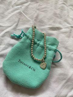 Tiffany and Co heart pendant beaded bracelet