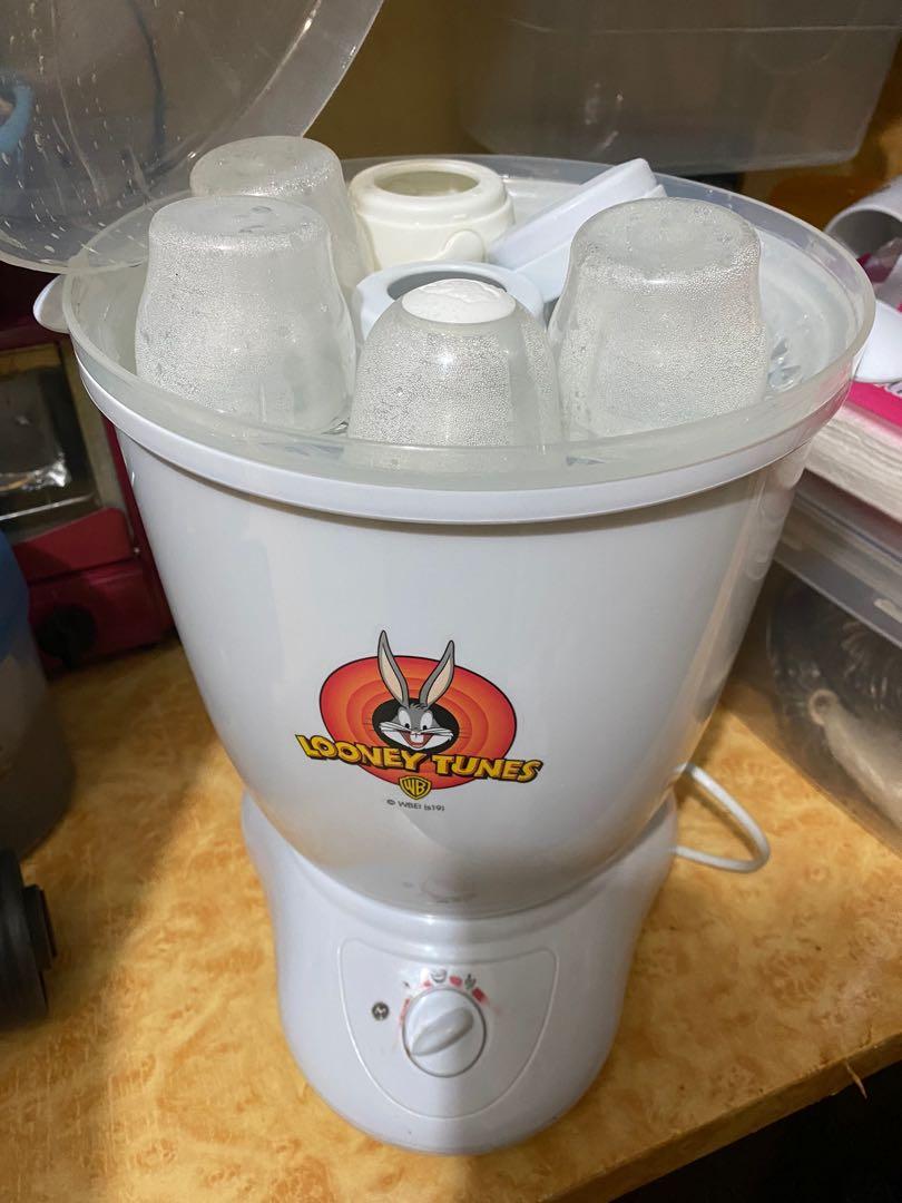 Looney Tunes Multi-Purpose Rapid Steam and Sterilizer (Category: Breastfeeding & Bottle Feeding) located in Mandaluyong City. Submitted by karizzmaph (Listing ID 1157692569, Image 2). Description: Looney Tunes Multi-Purpose Rapid Steam and Sterilizer ₱700 Color: White 💖 Well used yung sterilizer but not abused, faded na ang print sa sterilizer pero working pa rin 💖 Some accessories are not used 💖 Bottles not included 💖 FREE drying rack FEATUR