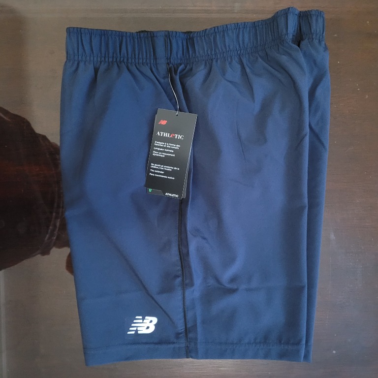 NEW BALANCE CORE RUN 7 INCH SHORTS