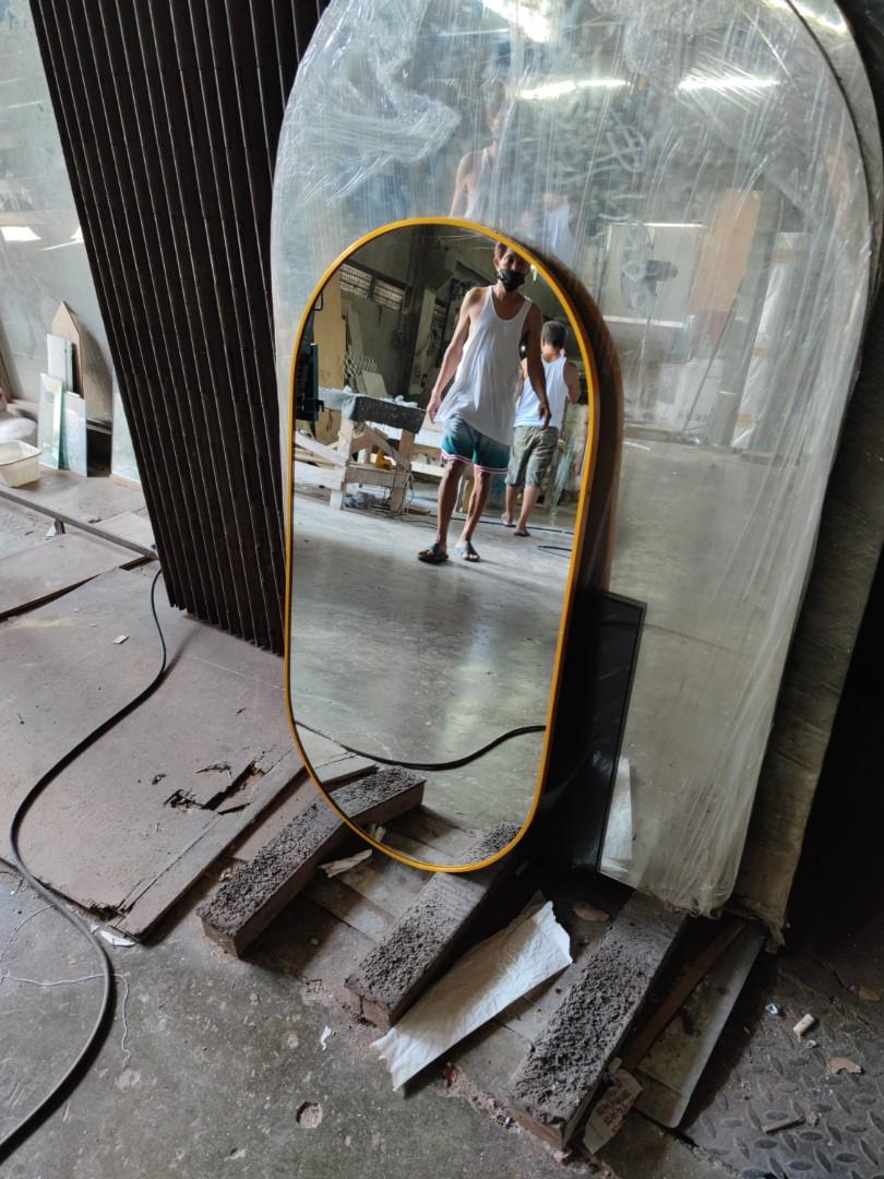 Oval mirror with frame (Category: Mirrors) located in Malabon City. Submitted by mirrors.ph (Listing ID 1157677693, Image 2). Description: Oval mirror with gold aluminum frame and plywood backing. Using 6mm thick copper free lead free mirror. Add P200 if with back hook. Size: 1.5ft x 3ft P1215 Available colors gold, glossy black, matte black, white and silver aluminum frame. Customize sizes and shapes are welcome..