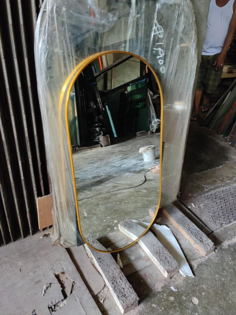 Oval mirror with frame (Category: Mirrors) located in Malabon City. Submitted by mirrors.ph (Listing ID 1157677693, Image 3). Description: Oval mirror with gold aluminum frame and plywood backing. Using 6mm thick copper free lead free mirror. Add P200 if with back hook. Size: 1.5ft x 3ft P1215 Available colors gold, glossy black, matte black, white and silver aluminum frame. Customize sizes and shapes are welcome..