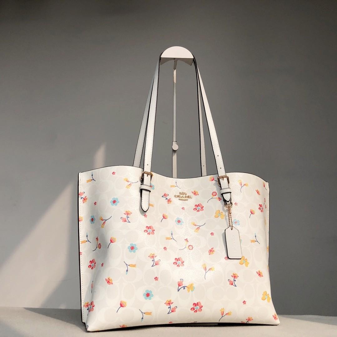 Coach top tote flower
