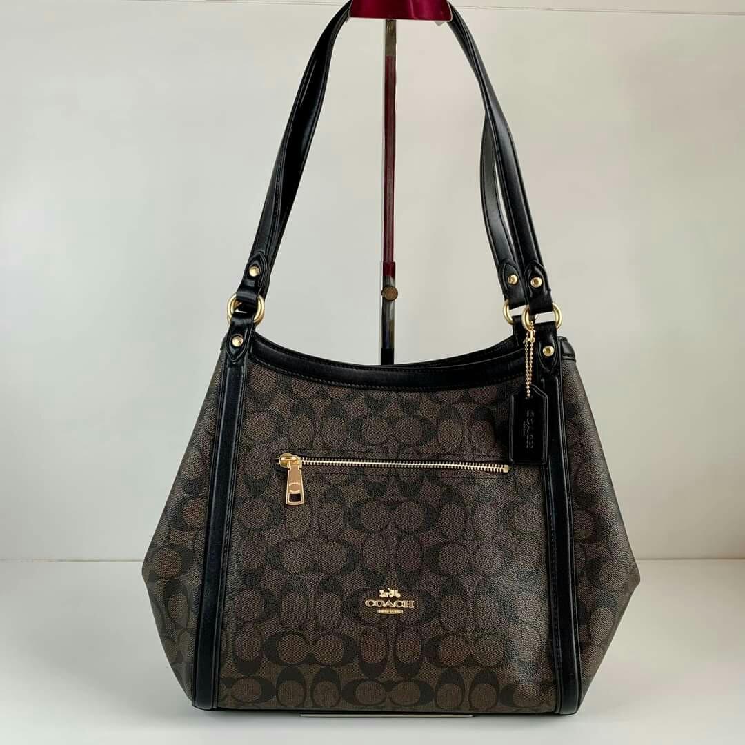 Kristy Shoulder Bag In Blocked Signature Canvas Luxury Bags Wallets on Carousell