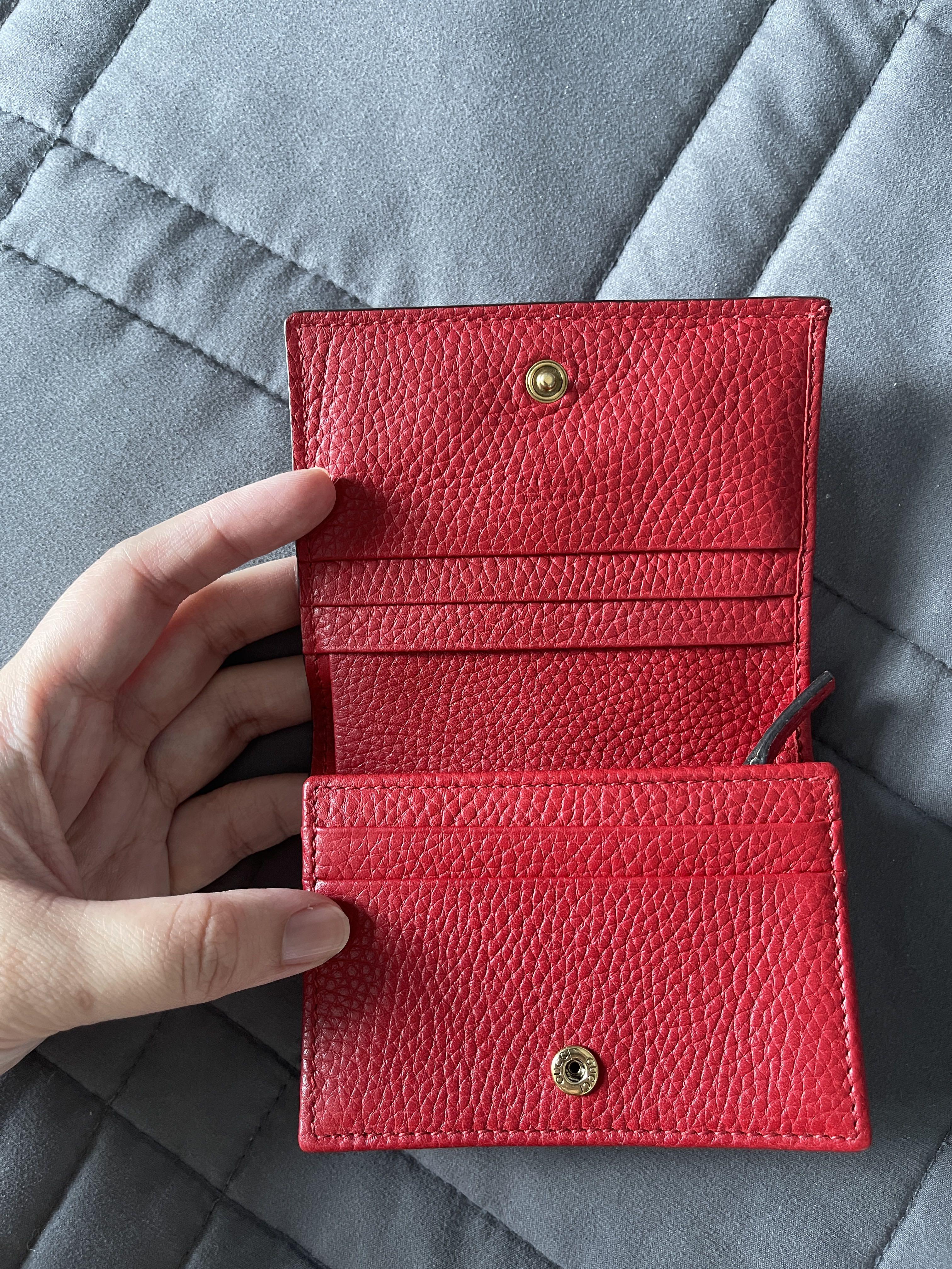 Authentic Gucci Red Compact Wallet (Category: Wallets & Card holders) located in Taguig. Submitted by hellofritzi (Listing ID 1152349705, Image 3). Description: From the Gucci Animalier collection!! Tiger Head Compact wallet in Mint condition, like new and selling low 🙂 You know I love tigers so much, reds, pinks, neutrals and limited eds 🙂 Selling my authentic Gucci red compact wallet that I only used for a week of CNY. Made from calf leather,