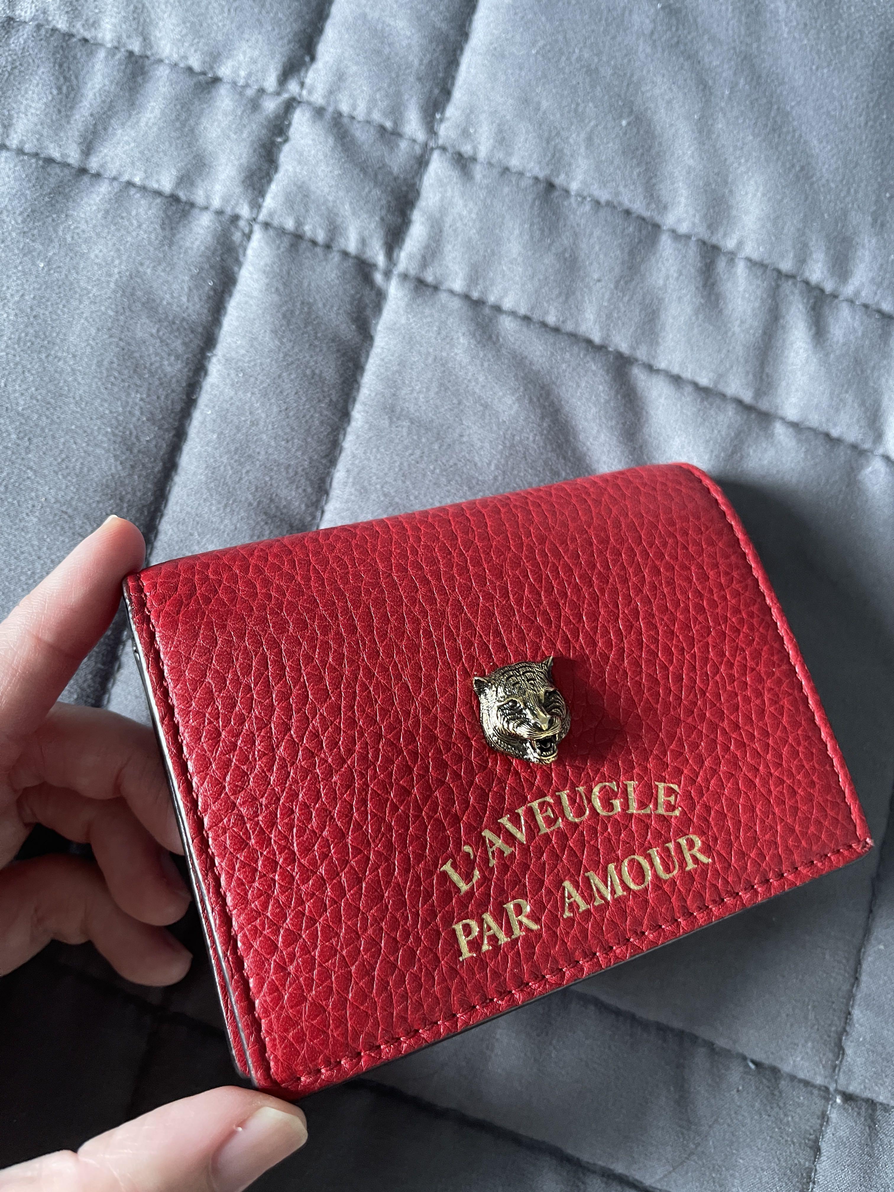 Authentic Gucci Red Compact Wallet (Category: Wallets & Card holders) located in Taguig. Submitted by hellofritzi (Listing ID 1152349705, Image 2). Description: From the Gucci Animalier collection!! Tiger Head Compact wallet in Mint condition, like new and selling low 🙂 You know I love tigers so much, reds, pinks, neutrals and limited eds 🙂 Selling my authentic Gucci red compact wallet that I only used for a week of CNY. Made from calf leather,