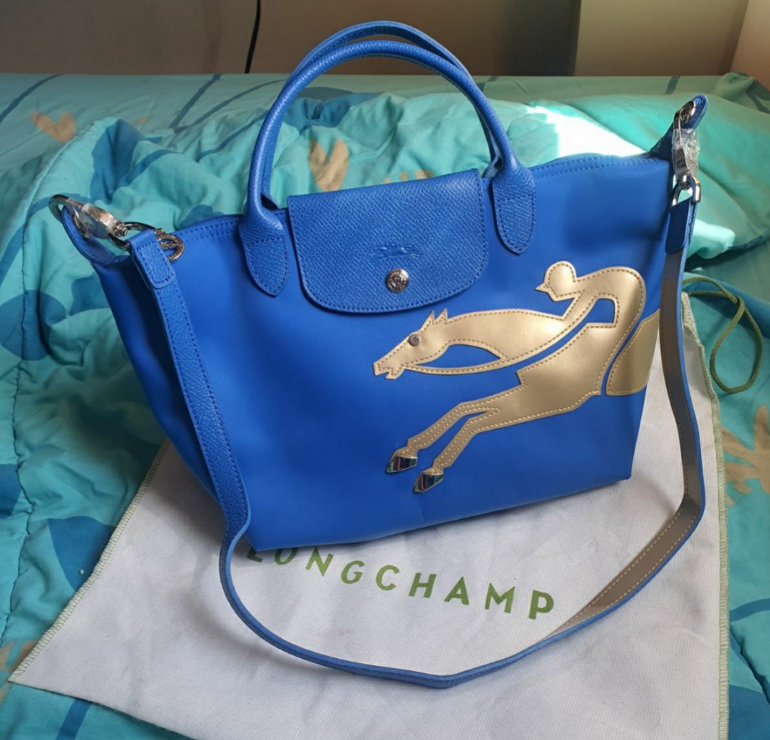 Longchamp bag top with horse design