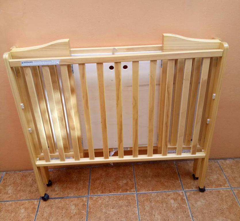Delta Children Folding Portable Baby Crib with 1.5 inch Mattress