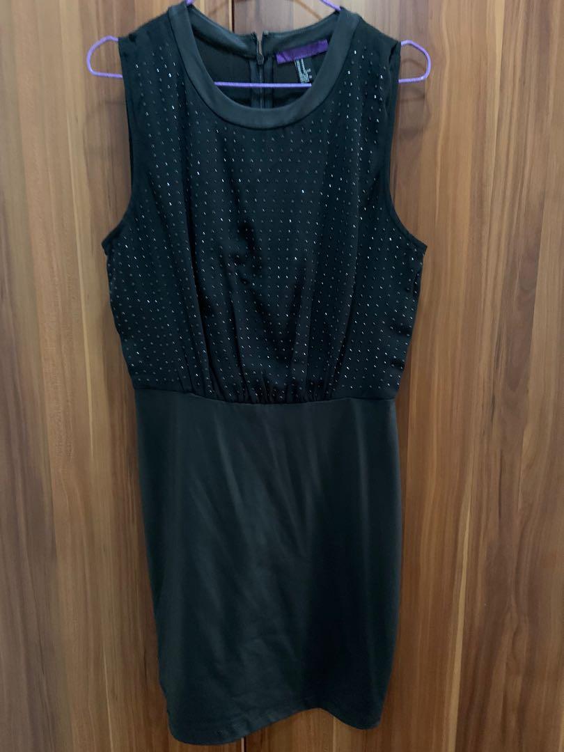 Forever 21 dress (Category: Dresses) located in Manila. Submitted by hflores_23 (Listing ID 1152765462, Image 1). Description: Studded black dress. Knee length. Can be used in office. Sheer fabric top, medyo faux leather ang itsura ng skirt but it’s not really leather like fabric. Very elegant Slight damage (tastas) in front - as in photo.