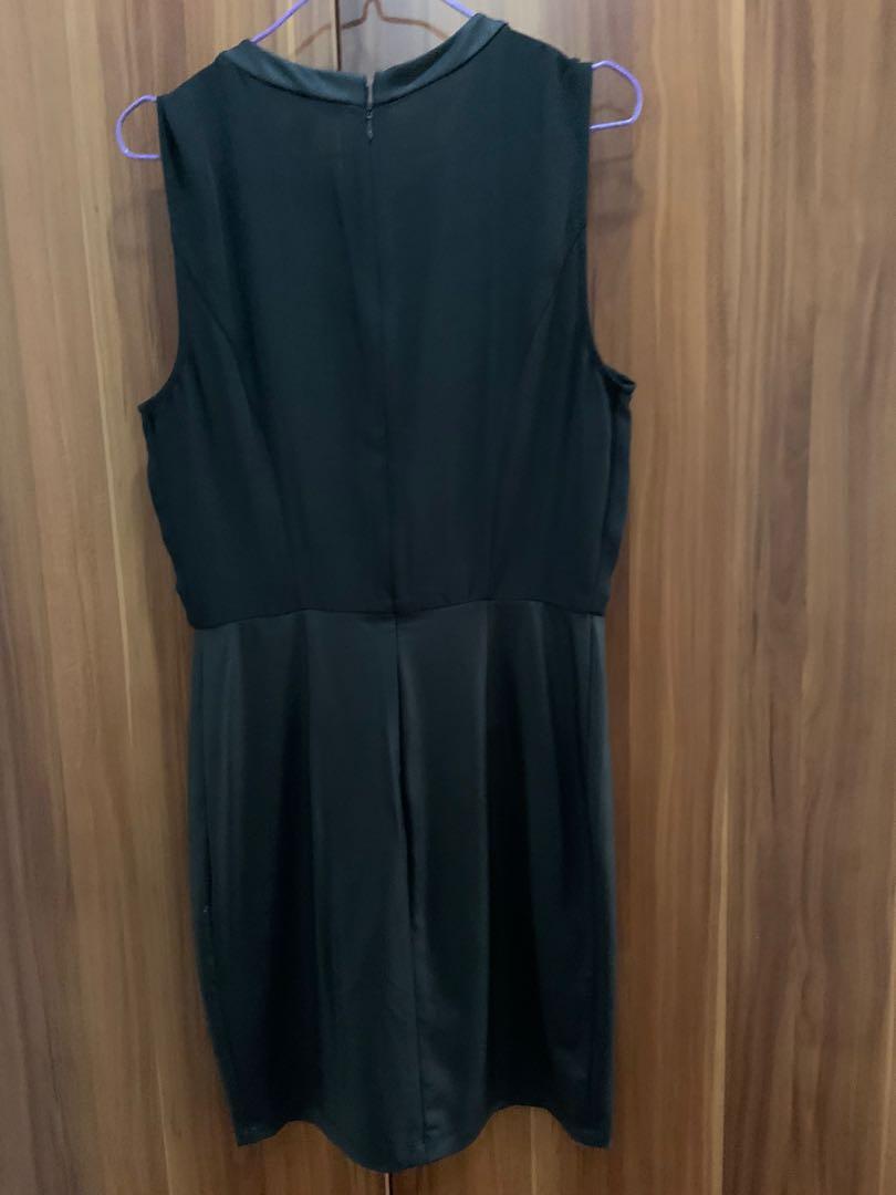 Forever 21 dress (Category: Dresses) located in Manila. Submitted by hflores_23 (Listing ID 1152765462, Image 2). Description: Studded black dress. Knee length. Can be used in office. Sheer fabric top, medyo faux leather ang itsura ng skirt but it’s not really leather like fabric. Very elegant Slight damage (tastas) in front - as in photo.