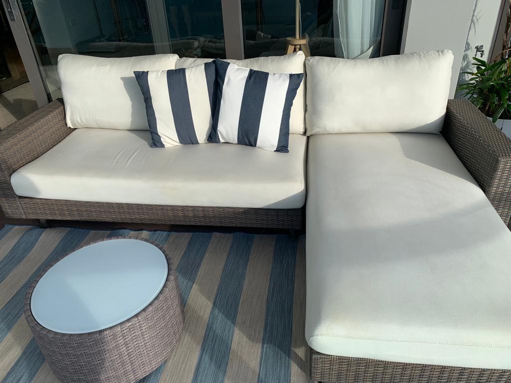 L shape outdoor sofa with chair, table and built in storage. King