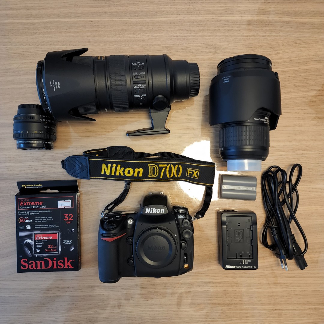 Nikon D700 with 3 lenses, 2 batteries and 2 compact flash card