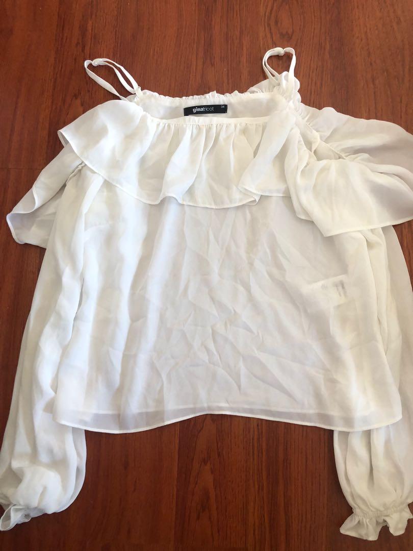 White Cold Shoulder Top (Category: Blouses) located in Taguig. Submitted by declutteringthings0908 (Listing ID 1152898512, Image 1). Description: With yellow stains but I think it can be washed off. Also available in black and purple. RFS: decluttering MOP: BPI, BDO, or GCash.