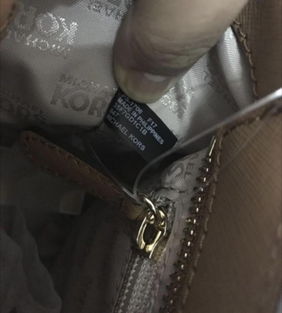 Marc Jacobs with tag and serial number