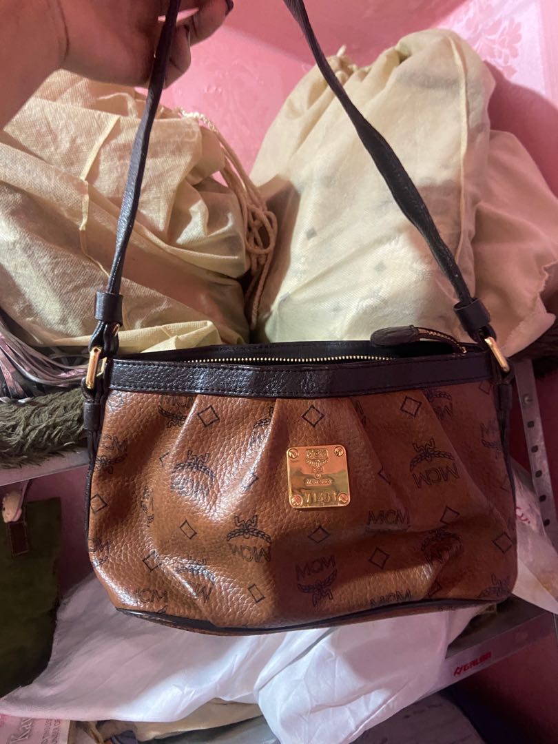 Mcm hotsell pochette beige