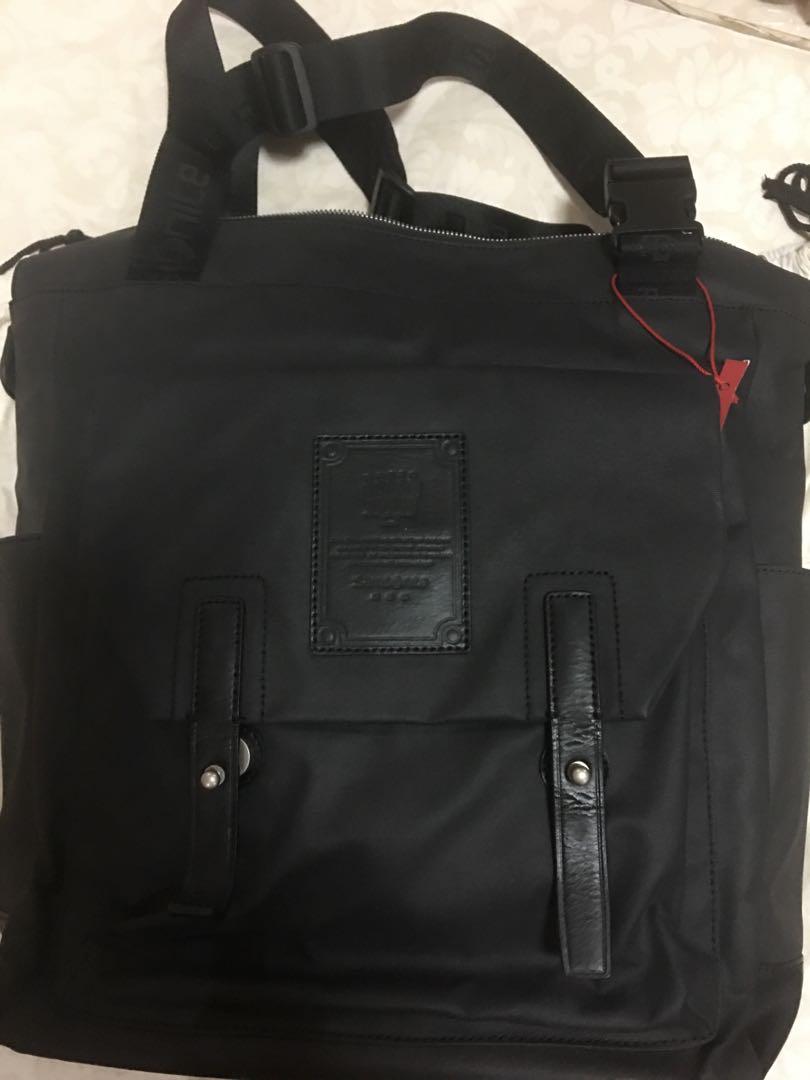 Samsonite RED tote bag (Category: Luxury Bags & Wallets) located in Manila. Submitted by jann.dy (Listing ID 1158116705, Image 2). Description: Brand new, unused Samsonite Red label tote bag Coated black canvas with leather trim Size 16 x 14 x 3” Multiple compartments, printed samsonite lining. Some minor defect on leather due to storage. Comes with dust bag. .