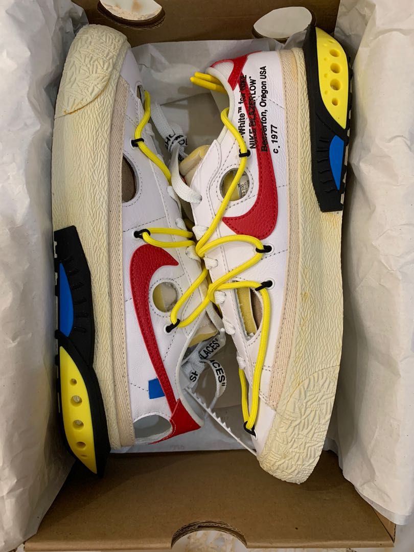 nike blazer low x trainers in cream and red