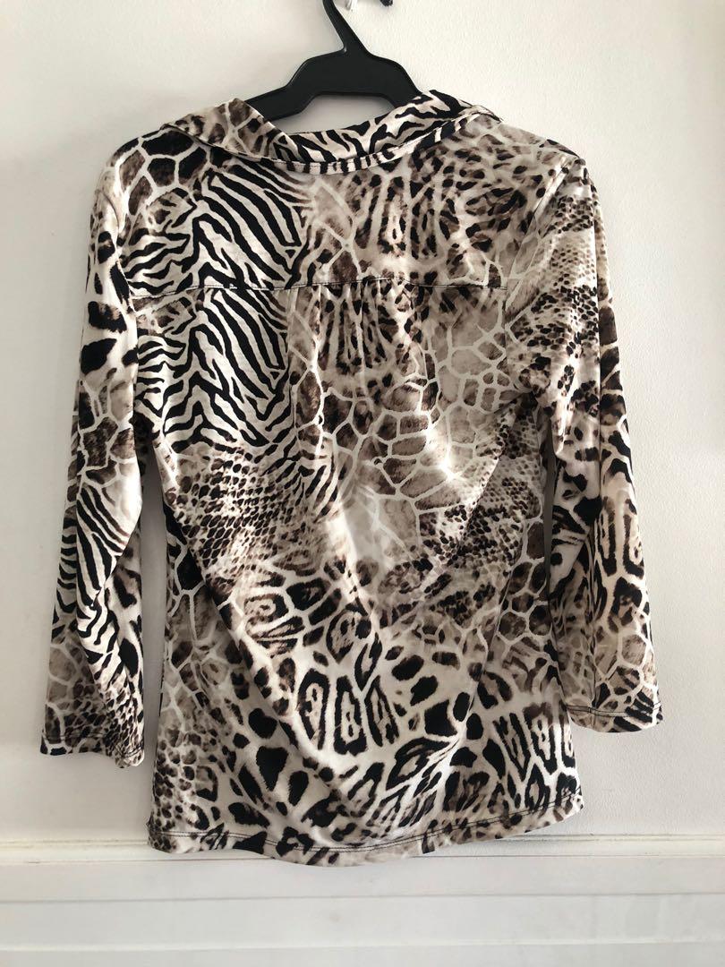 Animal Print Polo (Category: Blouses) located in Taguig. Submitted by declutteringthings0908 (Listing ID 1152981829, Image 2). Description: RFS: decluttering MOP: BPI, BDO, GCash.