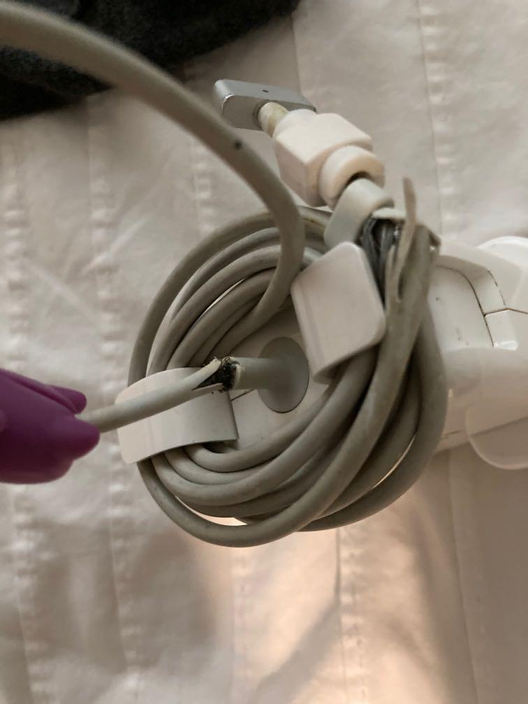 Apple MagSafe 2 (Category: Chargers) located in Kuala Lumpur. Submitted by matt777 (Listing ID 1153061663, Image 3). Description: Original Apple charger Cable is frayed as per pictures but completely usable and working .