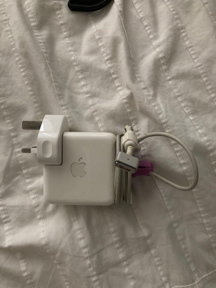 Apple MagSafe 2 (Category: Chargers) located in Kuala Lumpur. Submitted by matt777 (Listing ID 1153061663, Image 1). Description: Original Apple charger Cable is frayed as per pictures but completely usable and working .