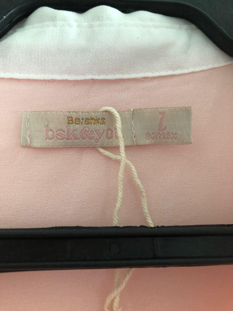 Bershka Sheer Pink Polo (Category: Longsleeves) located in Taguig. Submitted by declutteringthings0908 (Listing ID 1152982788, Image 3). Description: With damage as seen on photo. RFS: decluttering MOP: BPI, BDO, GCash.