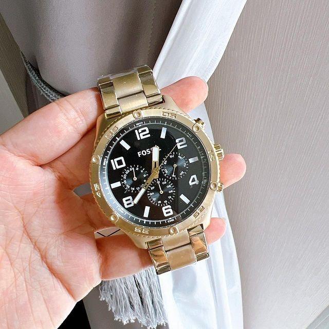 Gold and silver fossil watch men's online