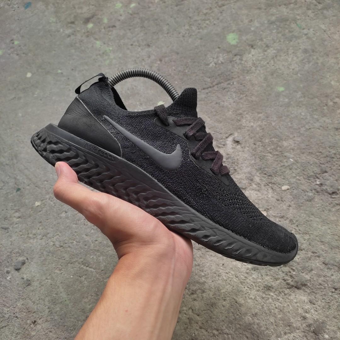 Nike epic react triple black on feet sales