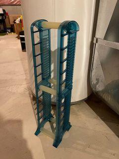 CD / DVD / Video Game / Blue Ray Stand/Holder Plastic stand - teal color 6.25” wide x 5” deep x 24” high