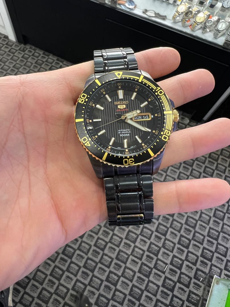 Seiko 5 sports black store gold