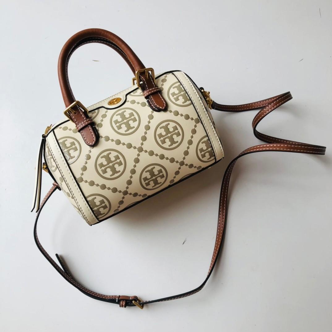 Tory Burch T Monogram Duffle Bag top handle with Crossbody strap white,  Women's Fashion, Bags & Wallets, Cross-body Bags on Carousell