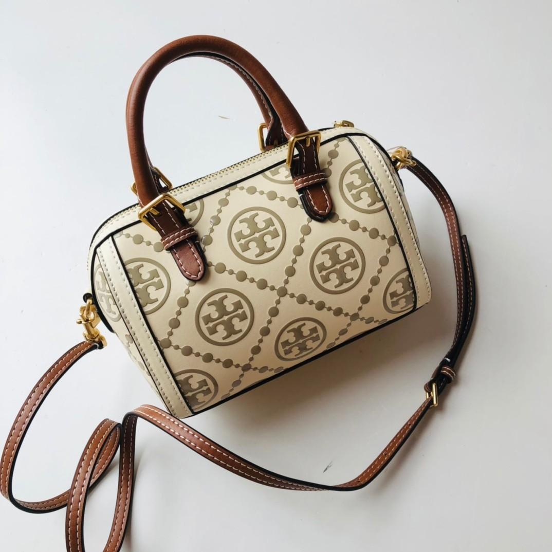 Tory Burch T Monogram Duffle Bag top handle with Crossbody strap white,  Women's Fashion, Bags & Wallets, Cross-body Bags on Carousell