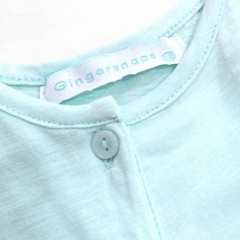 Used 1x - bundle of 2 cotton rompers (Category: Babies & Kids Fashion) located in Pasig City. Submitted by tinyminimalist (Listing ID 1153165512, Image 3). Description: Kids' cotton rompers with pockets. Used 1x only. P250 each or get both for only Php450. • pink Uniqlo romper - size M on tag - waistline when laid flat: 10.75 inches (unstretched) - shoulder to crotch: 26 inches • mint green Ginger-snaps romper - 12 on tag - waistline when laid fl