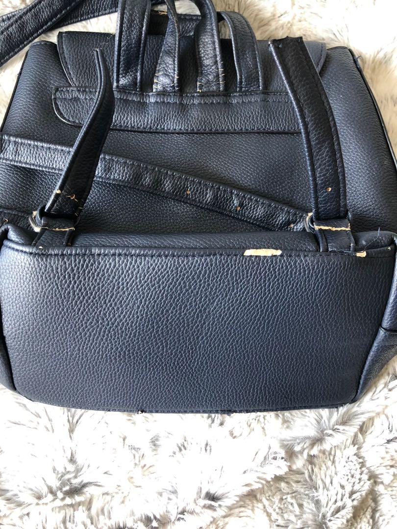 Womens backpack (Category: Luxury Bags & Wallets) located in Taguig. Submitted by joyce.prelovedph (Listing ID 1153232968, Image 3). Description: Stradivarius backpack, some dilapidated parts but can be fixed easily. Bdo or gcash payment .