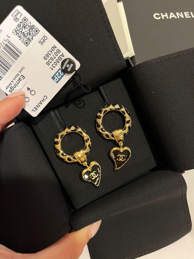 Chanel 22P earrings with hoop and black heart drop