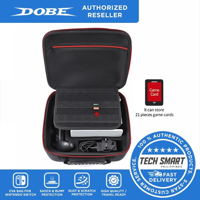 DOBE Storage EVA Bag for Nintendo Switch (Category: Cases & Covers) located in Manila. Submitted by techsmartph (Listing ID 247817293, Image 1). Description: • Comfortable handle strap is ideal for carrying. Large storage is suitable to take all the Nintendo Switch accessories when go on a trip • The protective Storage Bag perfectly fits for Nintendo Switch. It is big and hard enough to carry the Host of Nintendo Switch, handle, game card, charge