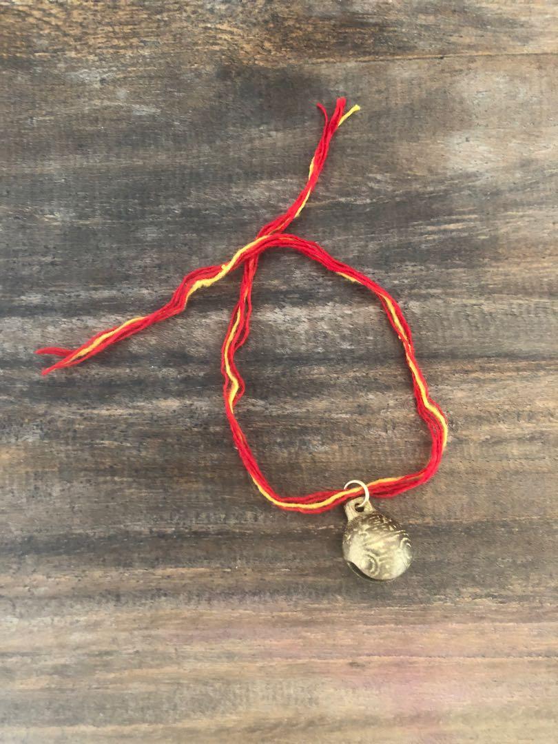 Red string with Tibetan Bell Charm (Category: Bracelets) located in Muntinlupa City. Submitted by declutter_with_me (Listing ID 1153430367, Image 1). Description: Red string with Tibetan Bell Charm Worn from protection .
