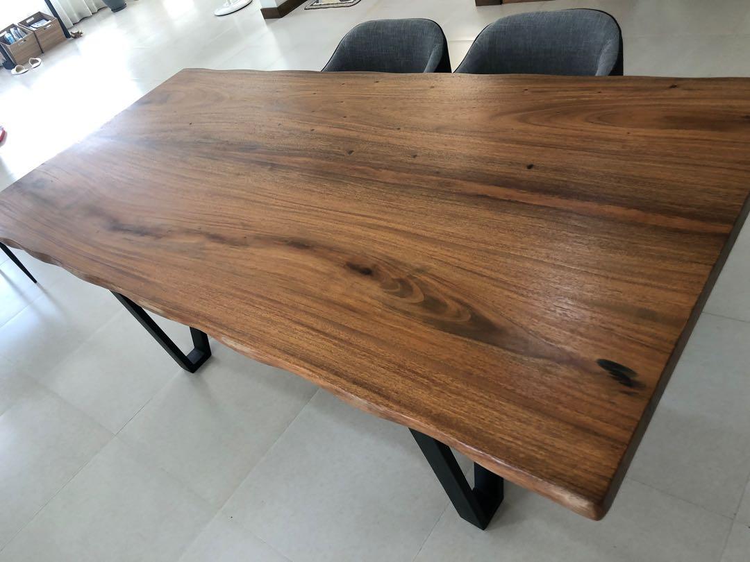 Solid Acacia Wood Dining Table (2” slab) (Category: Tables & Sets) located in Makati City. Submitted by wendy.alvarez (Listing ID 1153454988, Image 3). Description: Brandnew Solid Acacia Wood Dining Table (Table only) 6 to 8 seater Solid black matte metal legs 7ft x 4 ft Live edge joint slab .