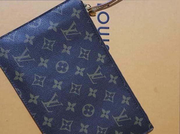 Authentic LV wristlet (Category: Luxury Bags & Wallets) located in Manila. Submitted by bornthisway22 (Listing ID 1153583427, Image 1). Description: authentic LV pouch wristlet wallet 100% original from u.s with serial code Almost new Box not included.
