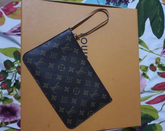 Authentic LV wristlet (Category: Luxury Bags & Wallets) located in Manila. Submitted by bornthisway22 (Listing ID 1153583427, Image 2). Description: authentic LV pouch wristlet wallet 100% original from u.s with serial code Almost new Box not included.