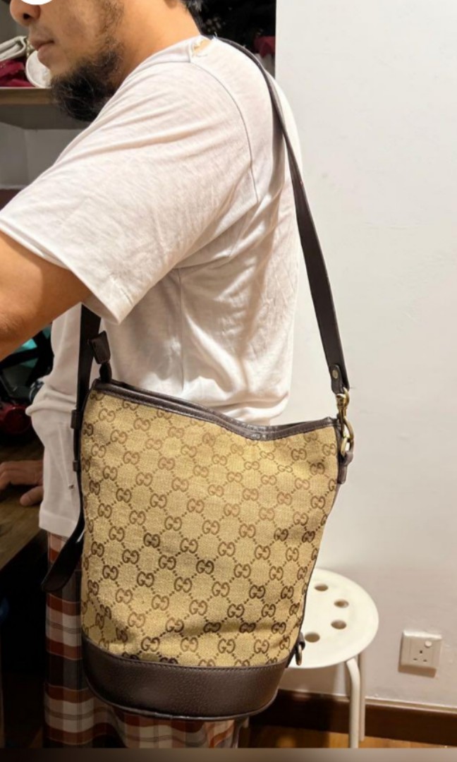 Gucci canvas sling 2025 bag