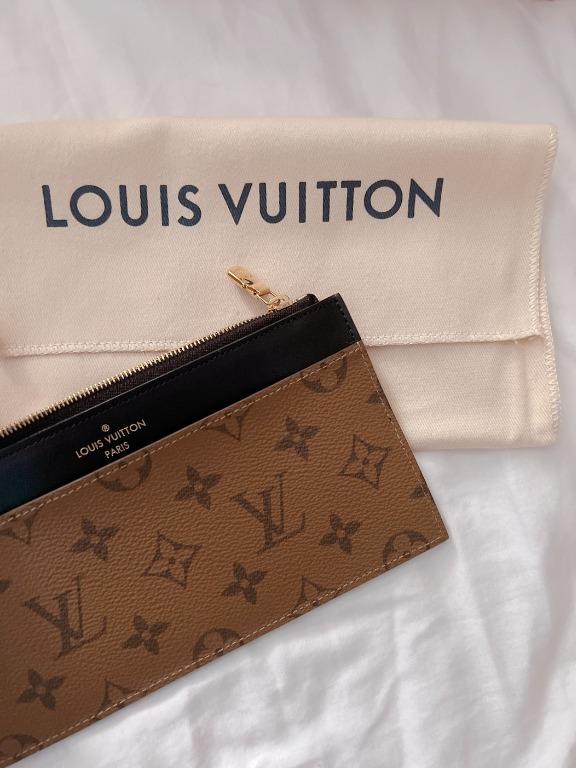 Louis Vuitton® Slim Purse Monogram Reverse. Size