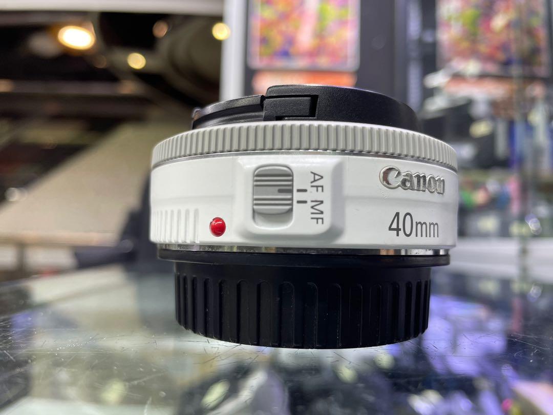 白色新淨CANON EF 40mm F2.8 STM, 攝影器材, 鏡頭及裝備- Carousell