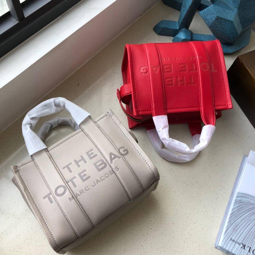 Original Marc jacobs unisex totes with strap, Luxury, Bags & Wallets on  Carousell