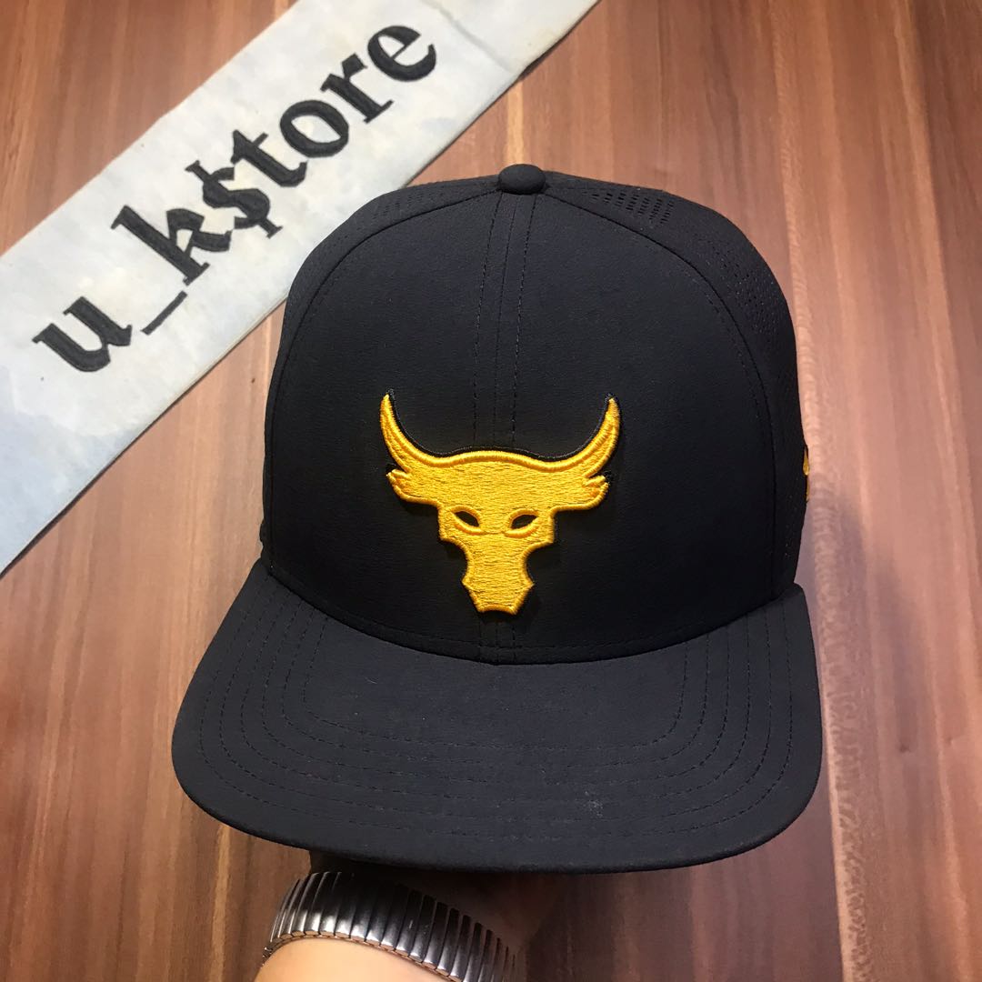 Topi under shop armour the rock