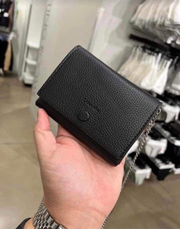 Calvin klein mini hotsell wallet bag