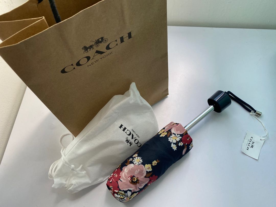 Coach umbrella, Hobbies & Toys, Travel, Umbrellas on Carousell