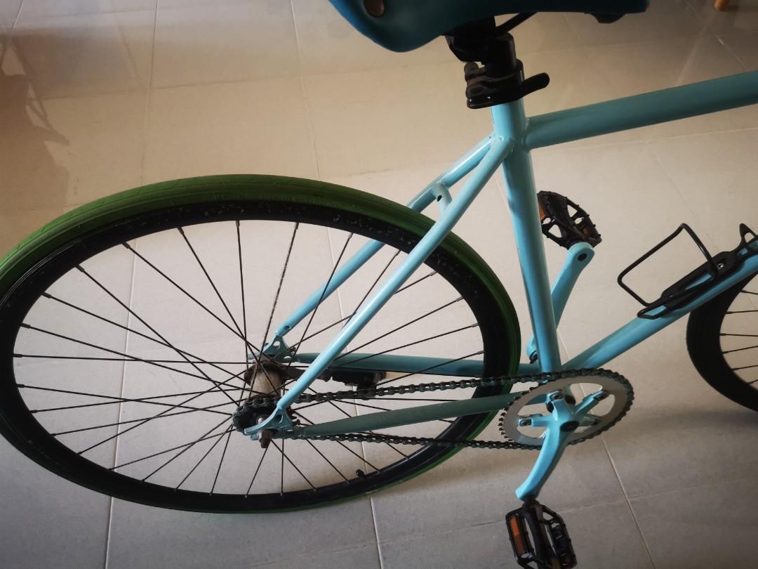 Fixie (Category: Bicycles) located in Singapore. Submitted by wwq1215 (Listing ID 1158201166, Image 3). Description: fixie with drop bar. coastal brake free wheel front tyre still new. chain life still good. abit dusty and rusty, just a wipe and grease will do. what u see is what u get, come with phone holder, pump holder, water bottle holder. slight nego, low baller wont reply..