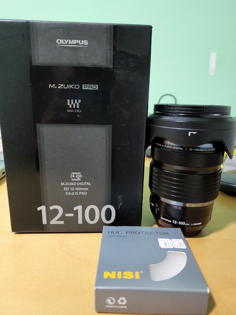Olympus 12100 f4.0 IS Pro, Photography, Lens & Kits on Carousell